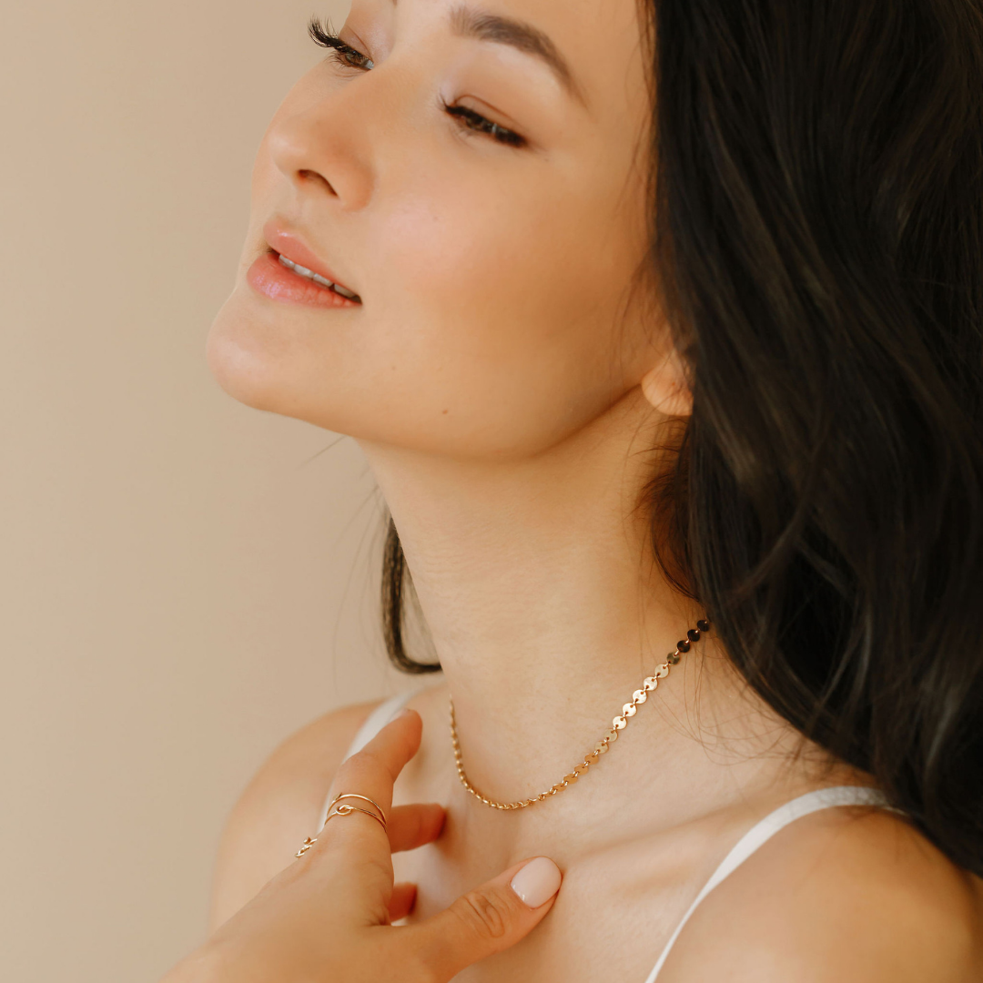 Dazzle Disc Choker in gold on model