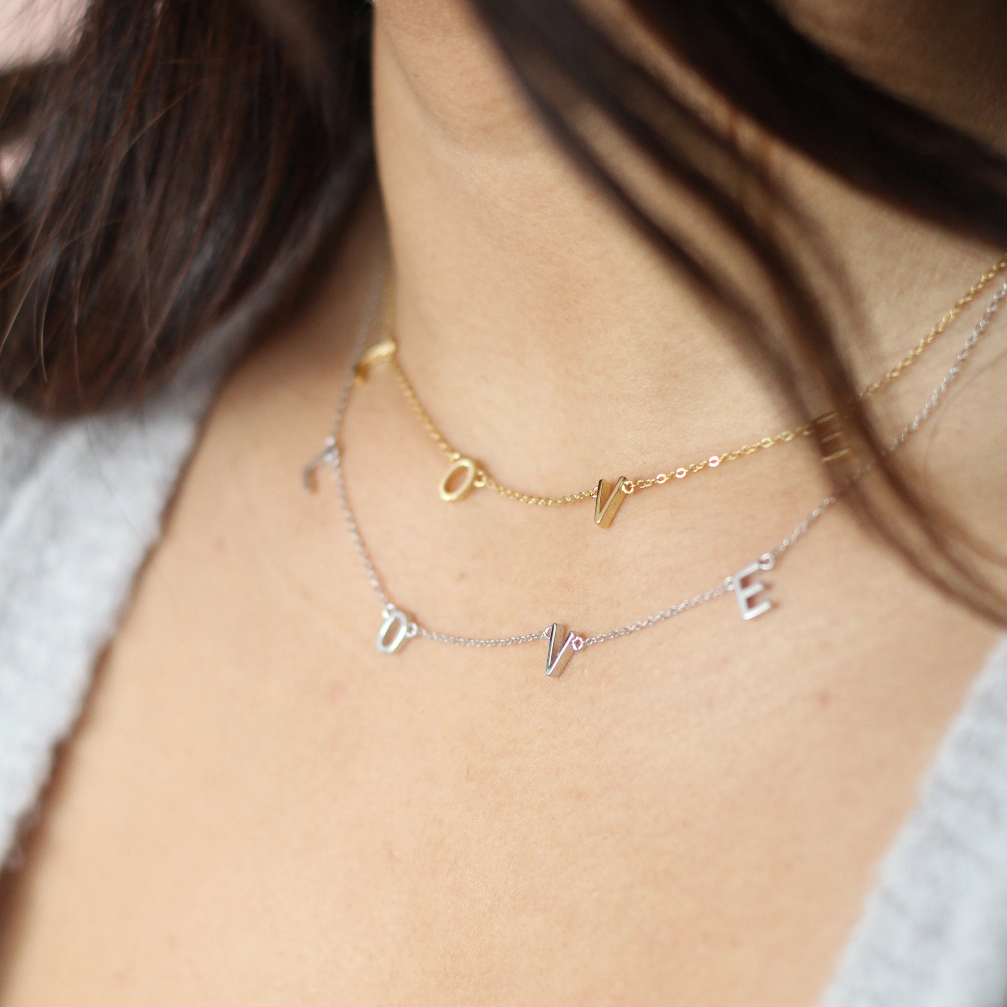 LOVE letter necklace in gold and silver