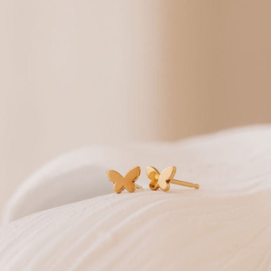 solid gold butterfly stud earrings