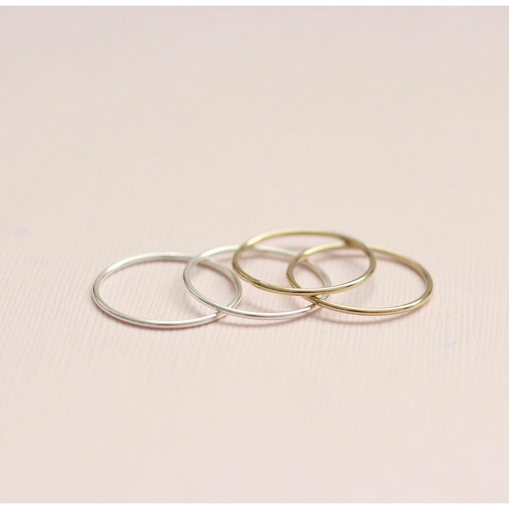 Plain minimal stackable rings in sterling silver and gold